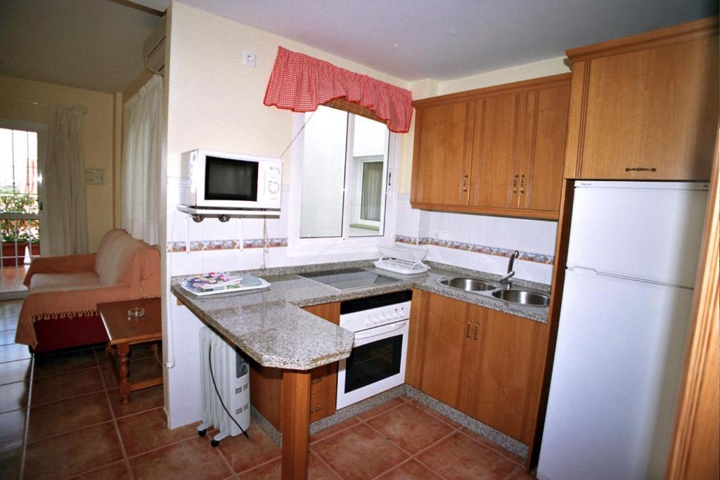 Apartamentos La Casa Del Barrio Maro Room photo